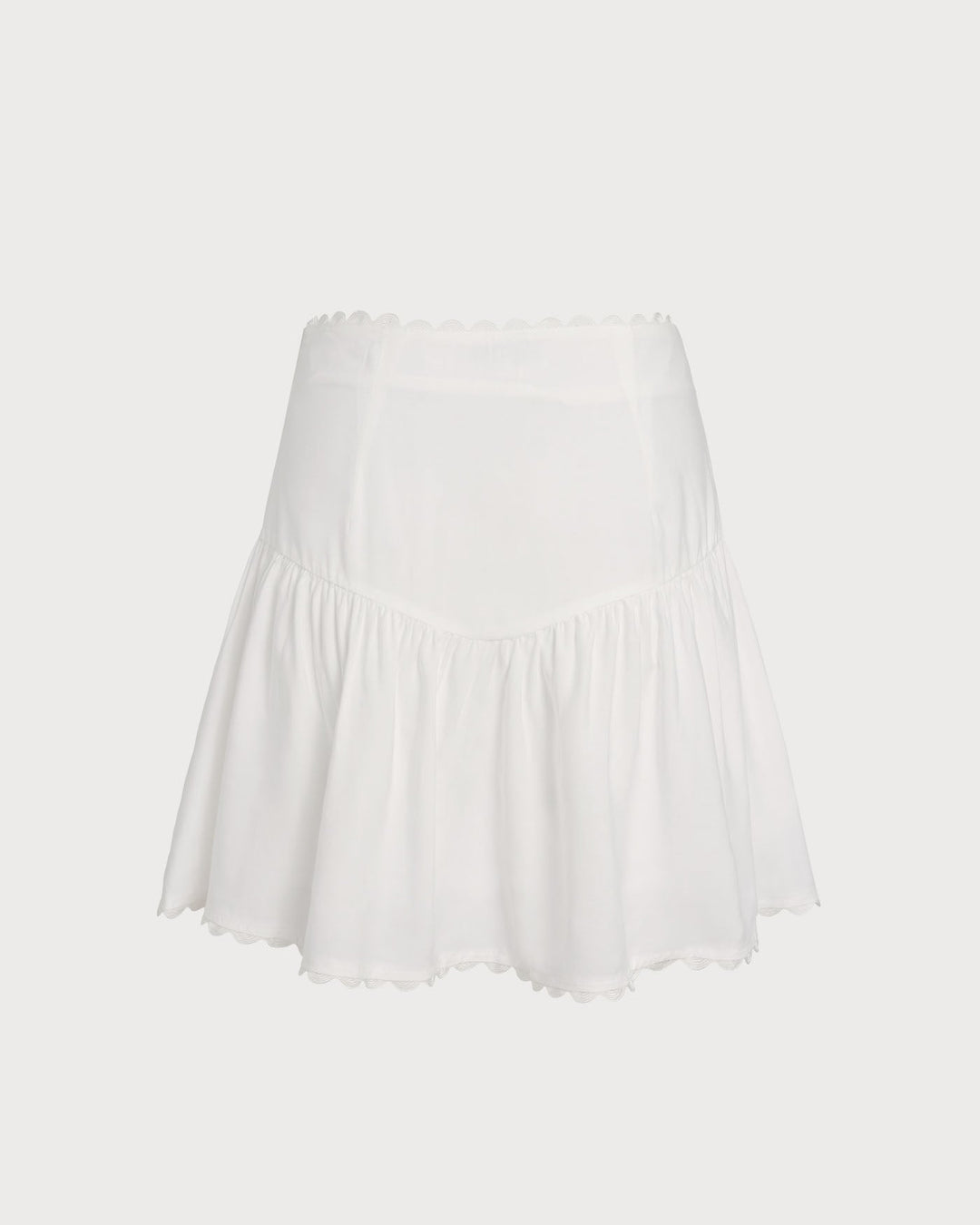 Falda Mini Arrugada con Botón Blanca