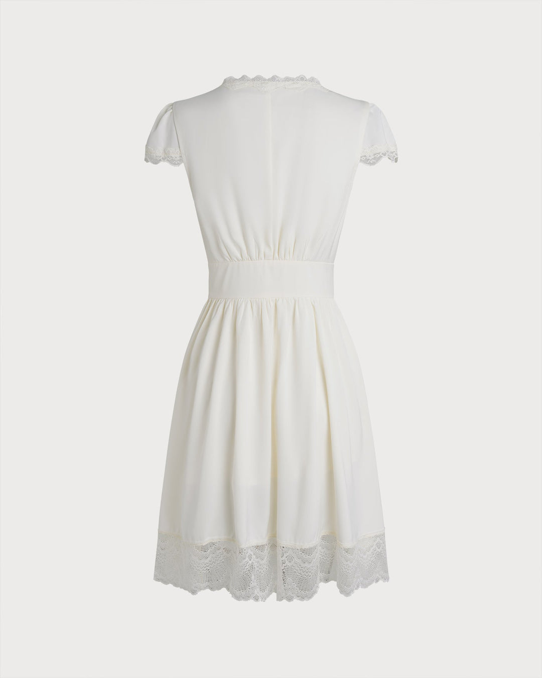 Vestido Mini de Encaje con Escote en V Color Albaricoque