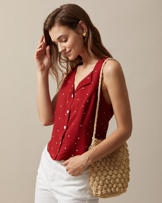 El Chaleco Sin Mangas de Cuello en V con Estampado de Lunares Rojos