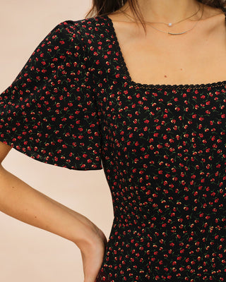 Vestido Midi Floral Negro con Cuello Cuadrado y Mangas de Mariposa